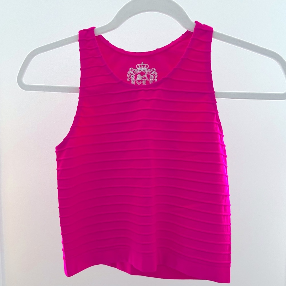 Never worn, hot pink cropped tank top. Size “one size fits most”